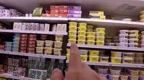 Hand pointing serial about picking Becel cream Stock Footage 50560959