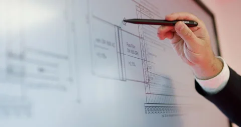 Hand pointing with stylus at technical engineering schematic on digital screen Stockbeeldmateriaal 329562175