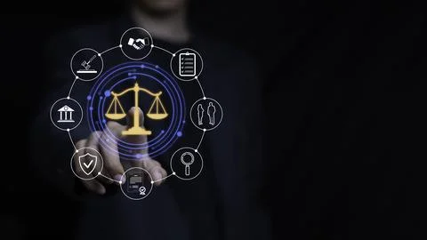 Hand pointing at virtual justice scale interface with surrounding legal ico.. 库存照片