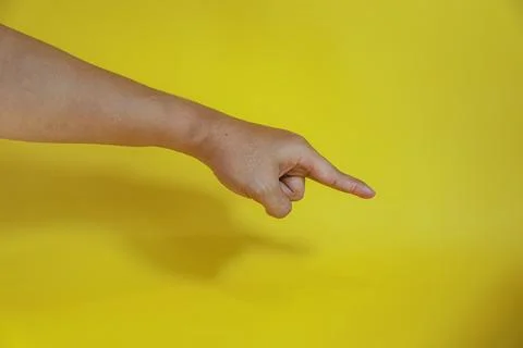 Hand pointing on virtual object with index finger, making gesture Stock Photos