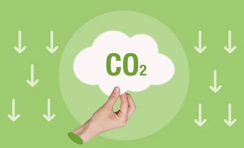 Hand points to CO2 cloud against green background. Downward arrows suggest .. Fotos Stock