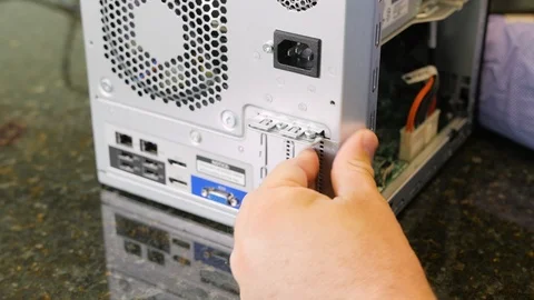 Hand points to the ports of the PC Stock Footage 124741792