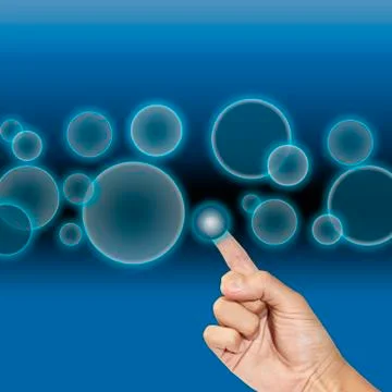 Hand points to touchscreen interface 스톡 사진