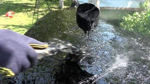 Hand pour resin on surface construction site Handheld shot. 4K Stock Footage 57195357