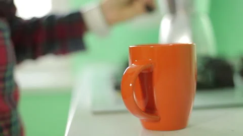 Hand pouring coffee into the cup, close-up Stock Footage 45795476
