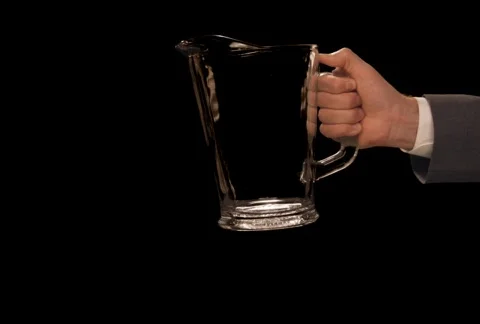 Hand Pouring Pitcher Stock Footage 754722