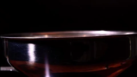 Hand Pouring Roasted Coffee Beans Into Metal Funnel Macro Stock Footage 323401898