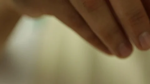 Hand Pouring Salt Stock Footage 86138078