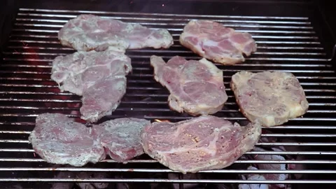 Hand Pours Beer On The Meat And Coals On The Grill. Pork Barbecue. Smoking Pork. Stock Footage 241006147