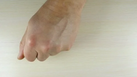Hand pours out on the surface of white and green tablets Stock Footage 119517903