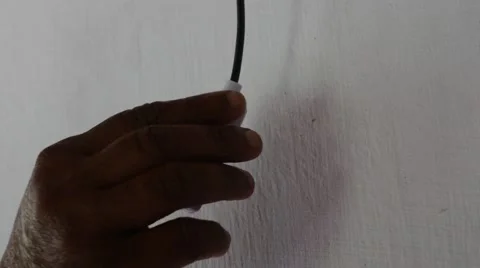 Hand on power switch of solar light Video stock 60223302