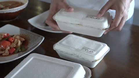 A hand preparing food from eco-friendly box for lunch in daily life 05 Stock Footage 120330014