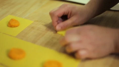 Hand preparing Pasta Ripiena in kitchen Stock Footage 107569746