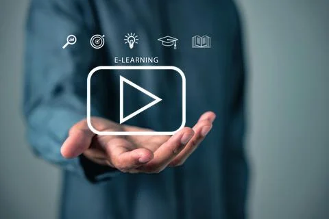 Hand presents e-learning and shows icons for analytics, an idea, a cap, a b.. Stock Photos