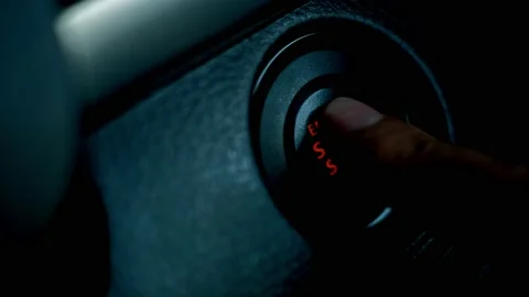 Hand press the button to start stop the car engine, Starting car engine. Close u Stock Footage 139997662