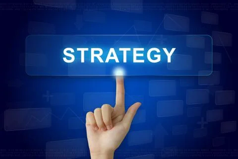 Hand press on strategy button on touch screen Foto stock