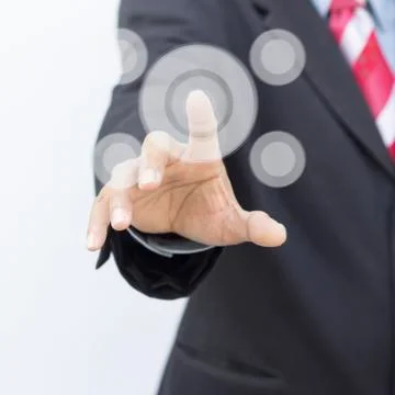 The hand presses the button Foto stock