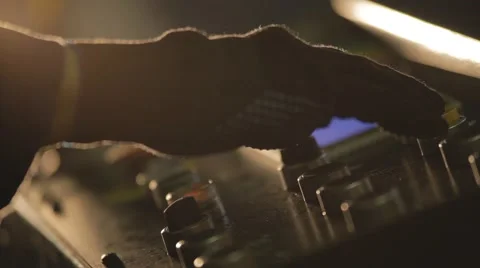 The hand presses the button on the remote control Stock Footage 68013390