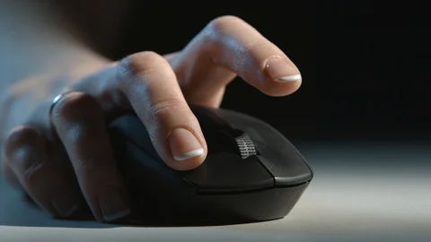 Hand presses a computer mouse button Stock Footage 101013581