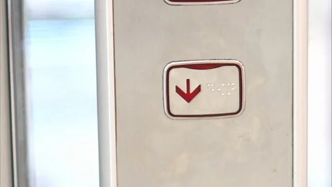 Hand presses the elevator button. Concept of choice Stock Footage 112000064