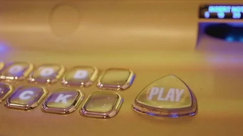 Hand Presses Play Button on Casino Slot Machine Console Stock Footage 316590850