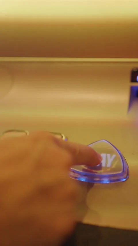 Hand Presses Play Button on Casino Slot Machine Console Stock Footage 316657348