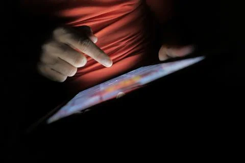Hand presses on screen digital tablet, close up Stock Photos