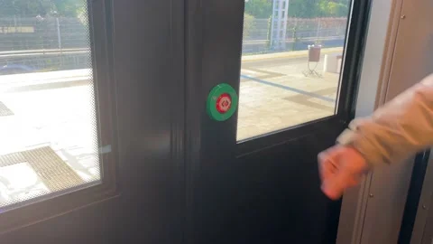 The hand presses the stop button on the train Video stock 228746799