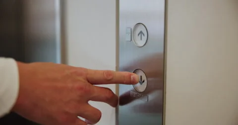Hand, pressing and button for elevator in office building for floor, selection Stock Footage 292600277