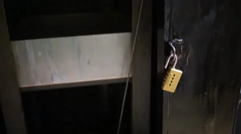 Hand pressing button and small freight elevator goes up. Stock Footage 64474084