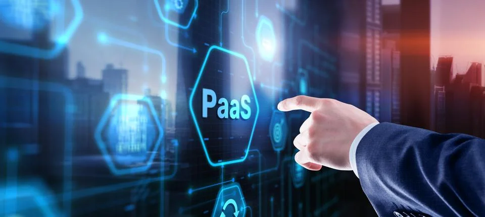 Hand pressing button on interface PaaS, Platform as a Service. Internet and Foto stock