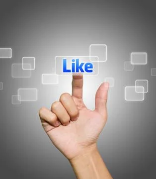 Hand pressing like button Stock Photos