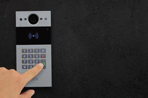 Hand Pressing Doorbell Keypad, Intercom Stock Photos