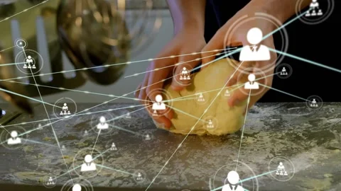 Hand pressing dough, icon appearing then multiplying, hands kneading and shaping Video stock 323272578