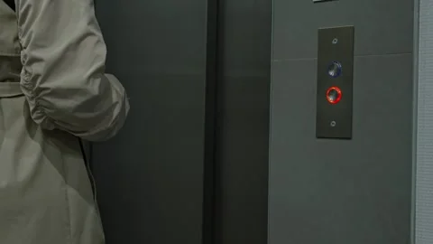 Hand Pressing Elevator Button In Lobby 動画素材 335950463