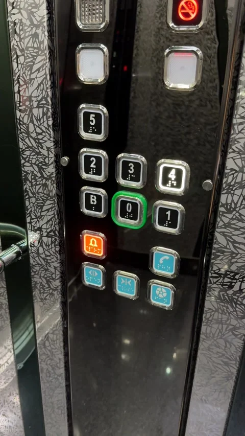 Hand pressing elevator button in modern lift with metallic panel and illumi.. Stock Footage 331147422