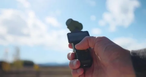 Hand Pressing Function Button Of DJI Osmo Pocket Outdoor. Stabilized 스톡 동영상 258903230