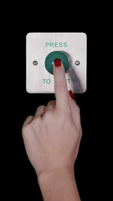 Hand pressing an industrial press to exit button vertical Stock Footage 319861625