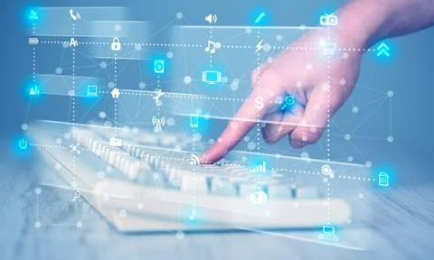 Hand pressing keyboard with high tech media icons Stock Photos