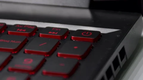 Hand Pressing Laptop Power Button, Turning On a Laptop Computer, Finger Presses Stock Footage 312071777