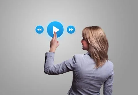 Hand pressing media player button 스톡 사진