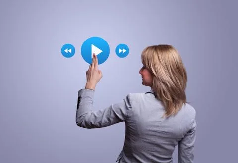 Hand pressing media player button 스톡 사진