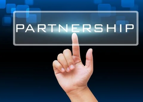 Hand pressing partnership button with technology background Stock Photos