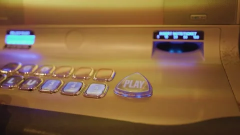 Hand Pressing Play Button on Casino Slot Machine Stock Footage 316664609