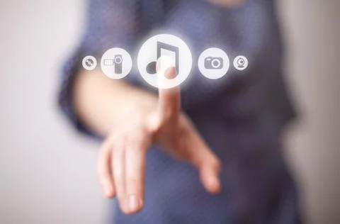 Hand pressing play button 스톡 사진