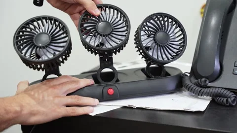 Hand Pressing Power Button On Desk Fans Stock Footage 341396156