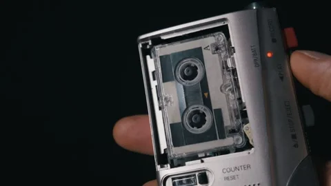 Hand Pressing Record Button On Vintage Silver Microcassette Recorder Stock Footage 327911039
