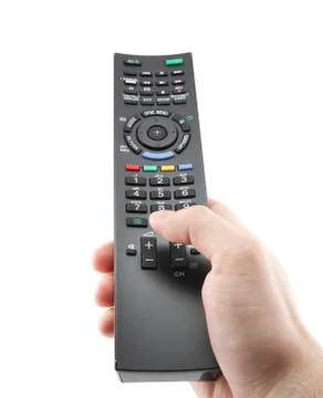 Hand pressing remote control with clipping path Stock Photos