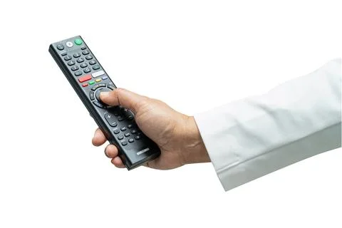 Hand pressing remote control TV television with clipping path isolated on w.. Stock Photos