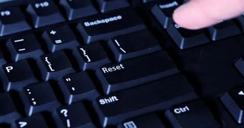 Hand pressing reset button 20 4K 25fps Stock Footage 73484934
